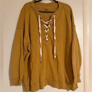 Aerie crewneck with lace up detailing | mustard with cream details in XL